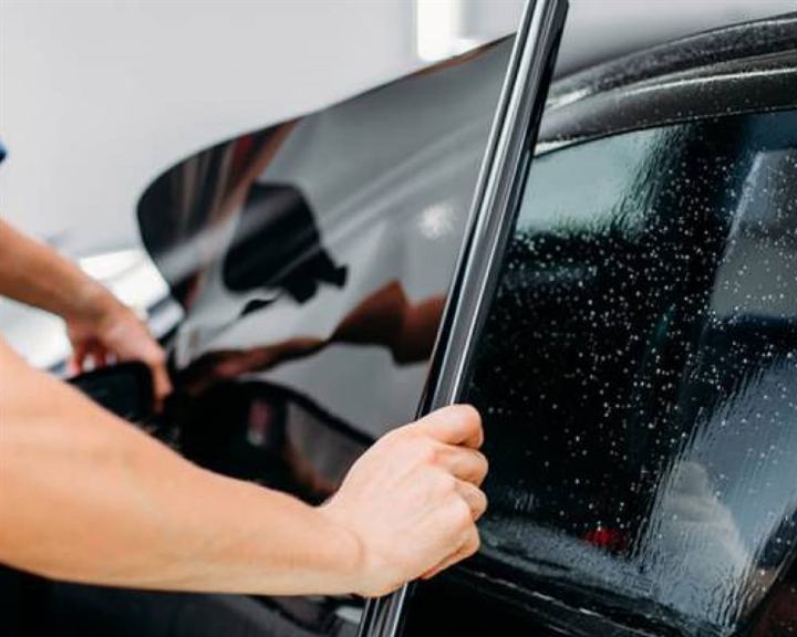Sun control film fitted to a car side window